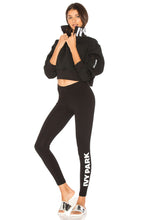 Load image into Gallery viewer, WOMAN IN  BLACK LEGGINGS
