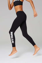 Load image into Gallery viewer, WOMAN IN  BLACK LEGGINGS
